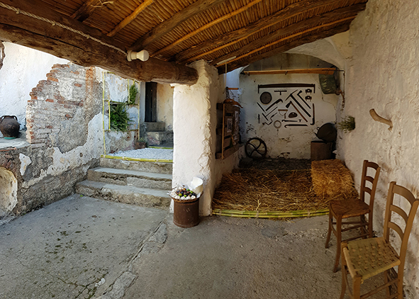 Tools of the local traditional culture in a wall set-up